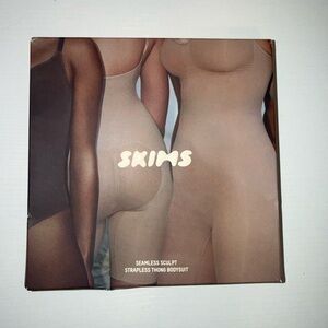 SKIMS Clay Seamless Sculpt Strapless Thong Bodysuit